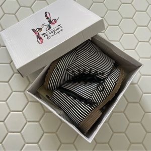 Black and white striped boots